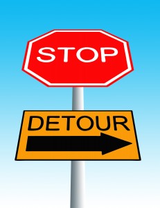 stop roadsign with detour sign